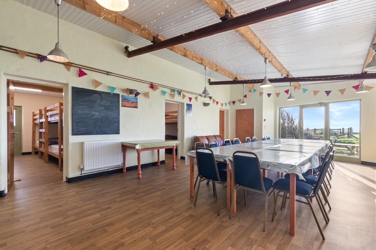 Large communal dining and social space at the outdoor instructor training centre